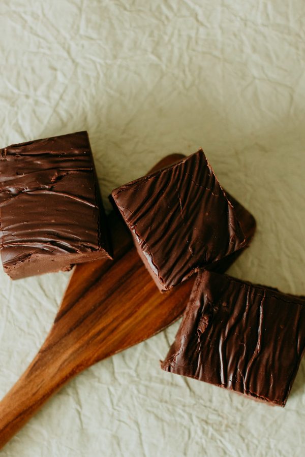 chocolate flavored fudge with a smear of fudge underneath it