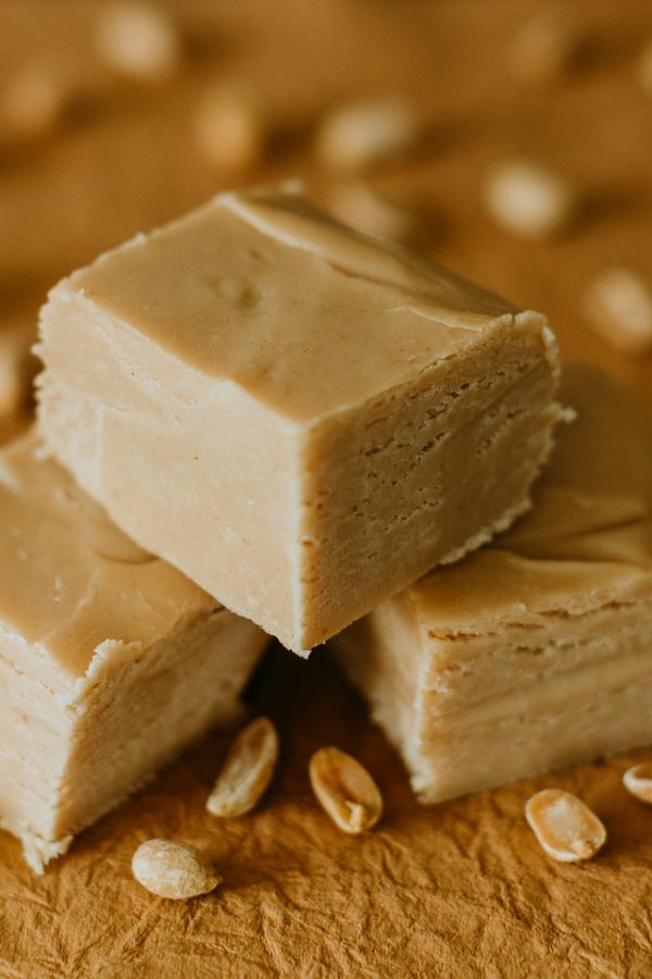closeup on peanut butter fudge squares in a stack