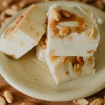 plate of squares of salt nut roll fudge