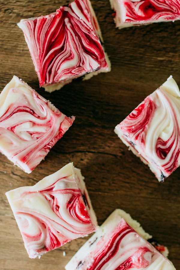 triple berry fudge arranged in an arc around another piece